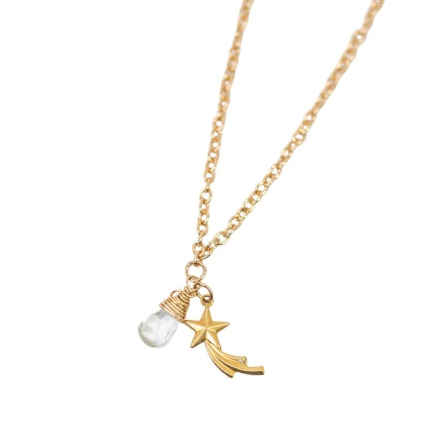 Child's gold necklace with dainty aqua quartz bead and brass shooting star charm by forai.