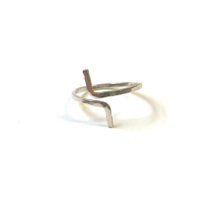 Hand-hammered sterling silver ring, adjustable size. Forai refugee made gifts. Fashion for good.